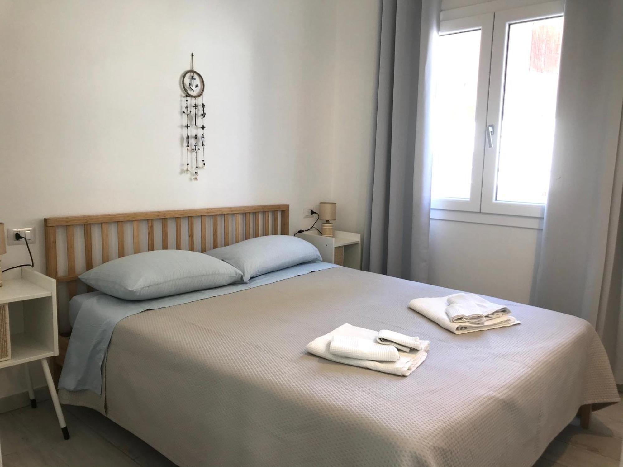 Case Vacanze "Bianco Mare" Porto Pino Cameră foto