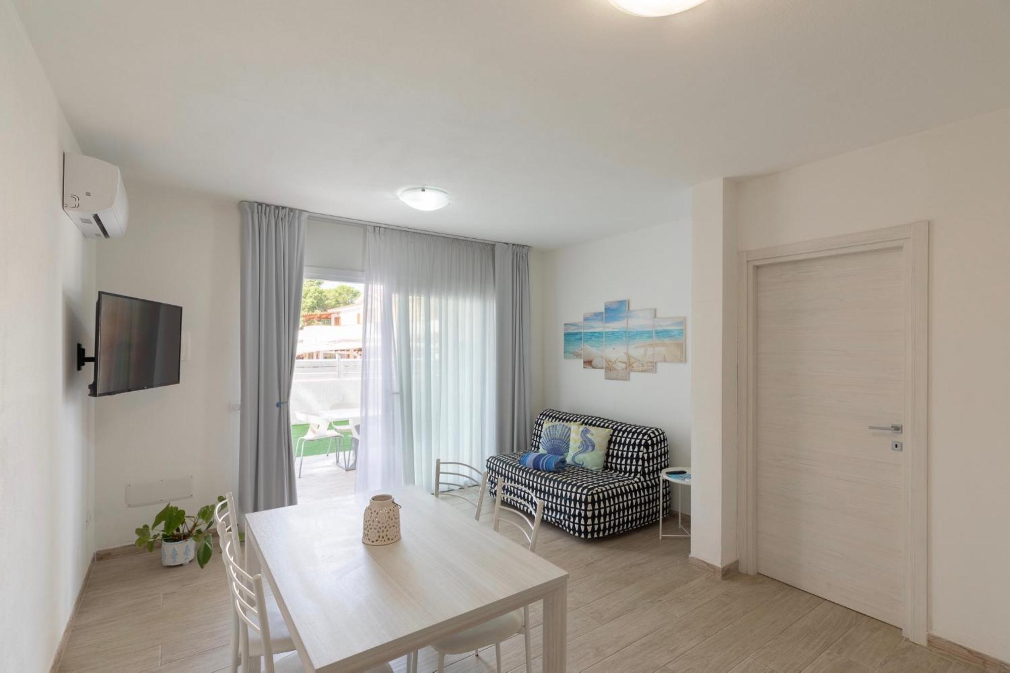 Case Vacanze "Bianco Mare" Porto Pino Cameră foto